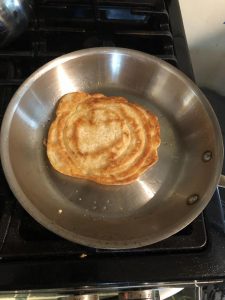 Sourdough pancake flipped